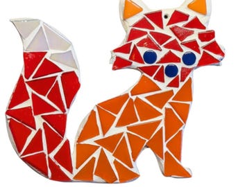 May include: A mosaic fox figurine with a red and orange tail, orange body, and blue eyes. The fox is made of small, triangular pieces of glass.