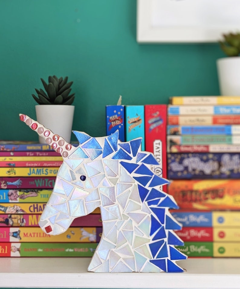 A mosaic craft kit to make a unicorn