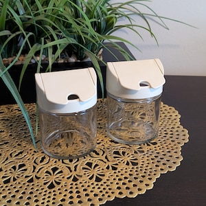 MCM Gemco Glass Sugar / Creamer Dispensers with Offwhite Screw-on Plastic Flip-top Lids