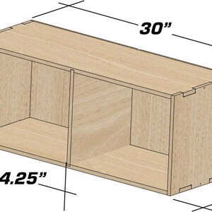 May include: A wooden shelf unit with two compartments. The shelf is 76.2 cm wide, 30.5 cm tall, and 36.2 cm deep.