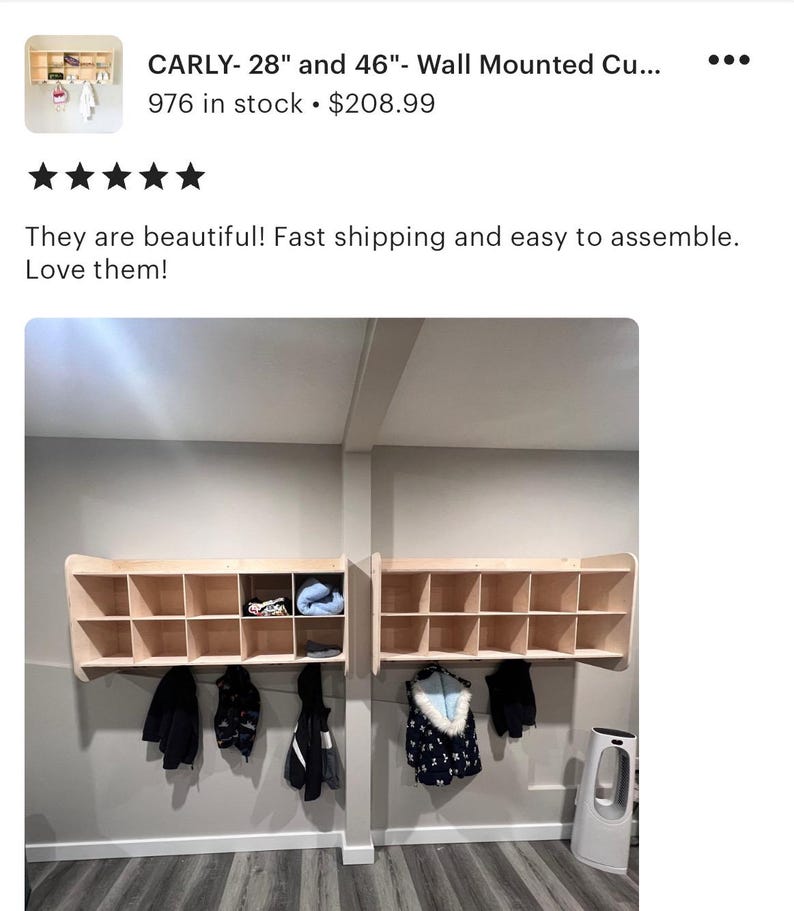 May include: Two wall-mounted cubby units with multiple compartments. The units are made of light-colored wood and are mounted on a gray wall. Coats and jackets hang below the units. The text "CARLY- 28" and 46"- Wall Mounted Cu..." is visible.