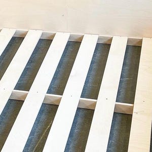 LISTING FOR SLATS only- 100.00 to add slats to Avery floor bed