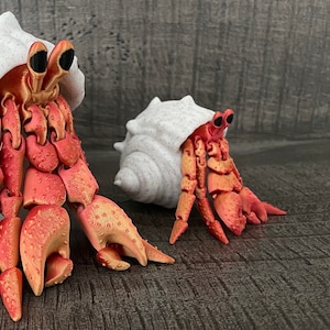 Mini Hermit Crab Action Figure - Same Crab everyone loves only Smaller - Flexible and posable - Complete with a Shell for a home -
