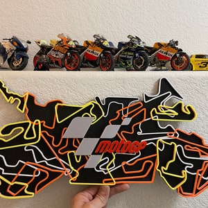 MotoGP-muurkunst (fanart) Racebaancontouren van wereldklasse in de vorm van een motorfiets