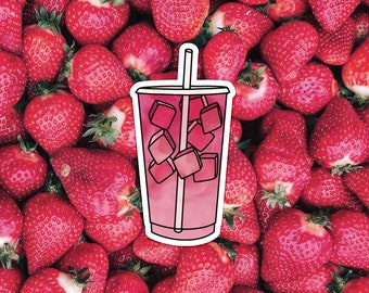 May include: A pink and white cartoon illustration of a glass with ice cubes and a straw. The glass is surrounded by red strawberries.