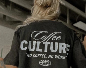 May include: Black t-shirt with white text that reads "Coffee Culture" and "No Coffee, No Work". A globe graphic is below the text.