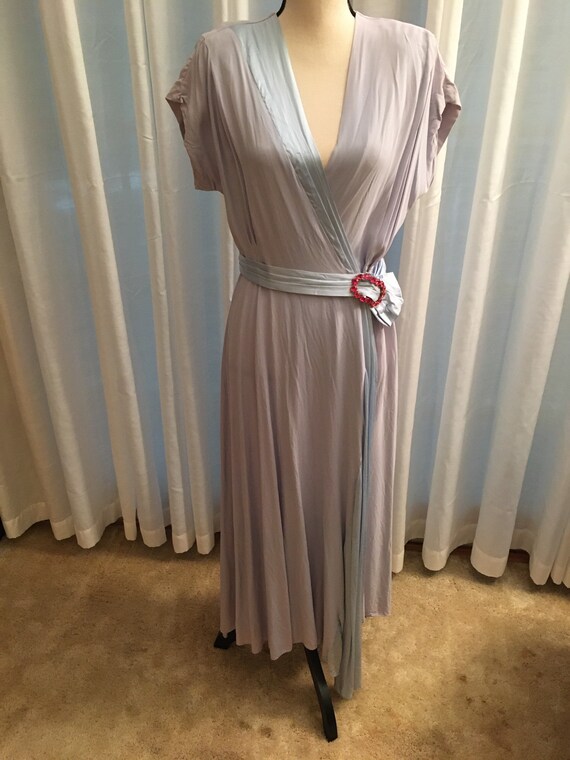 Textron silk and satin blue robe with pink pin.