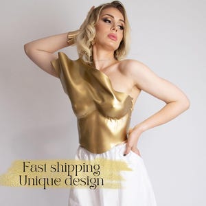 Złoty gorset na festiwal lub kostium na występy Formowany top Coachella Look Napierśnik Strój Festiwalowy EDM Dziewczyna na Imprezę Futurystyczny Wygląd