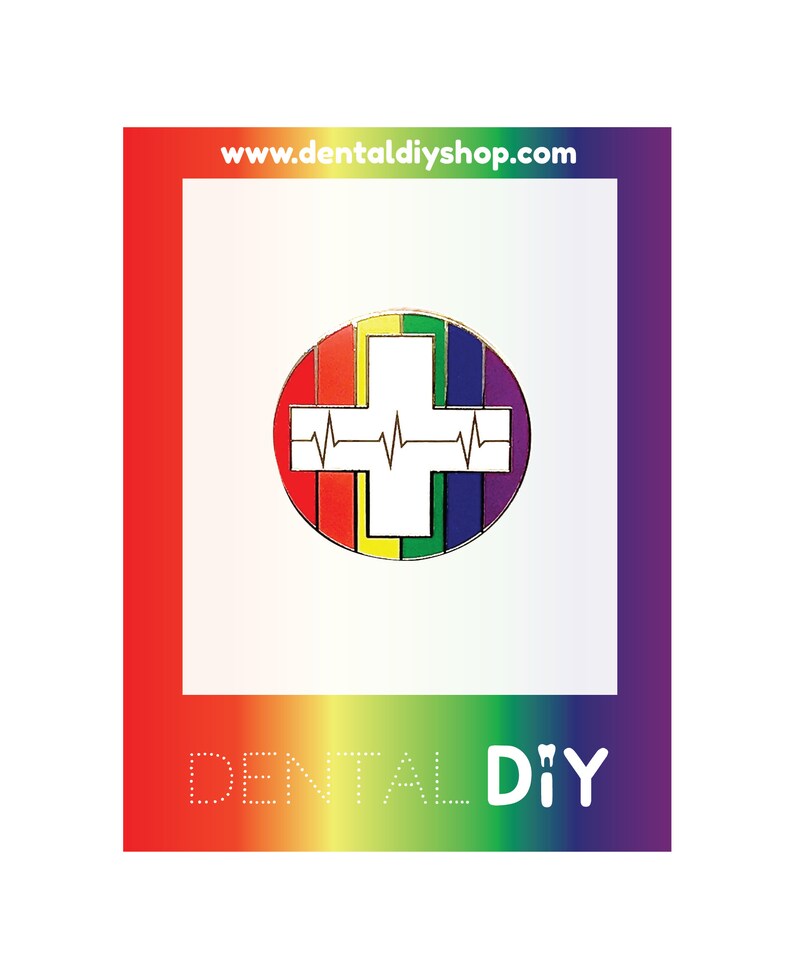 May include: A rainbow-colored enamel pin with a white cross and a heartbeat symbol inside. The pin says "Dental DIY" at the bottom and "www.dentaldiyshop.com" at the top.
