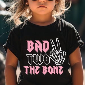 Bad Two The Bone 2nd Birthday Family Shirt Toddler Rock N Roll 2nd Birthday Skeleton Design For Girls Toddler Girl Black Tee