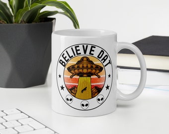 Believe Dat Alien UFO Humor Tasse
