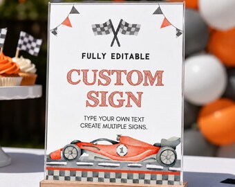 May include: A clear acrylic sign in a wooden base featuring a watercolor race car illustration, checkered flags, and orange pennants. The text reads FULLY EDITABLE CUSTOM SIGN, TYPE YOUR OWN TEXT, CREATE MULTIPLE SIGNS, and features a number one on the car.