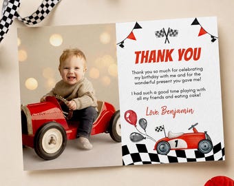 May include: A rectangular thank you card featuring a photo of a child sitting in a red toy race car. The card includes the text THANK YOU, a message of gratitude, the name Benjamin, and illustrations of checkered flags, balloons, and a race car.