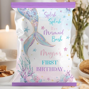 May include: Purple and white chip bag with a mermaid tail design. The bag says "Splish Splash It's a Mermaid Bash" and "Mayra's First Birthday".