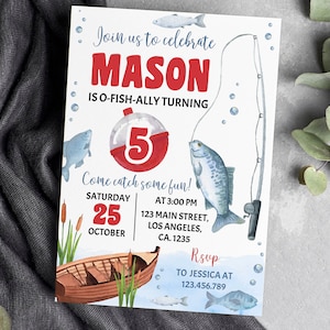 May include: A blue and white fishing-themed birthday invitation for a boy turning five. The invitation features a red and white fishing bobber with the number 5, a blue and white fish, and a fishing rod. The text on the invitation reads "Join us to celebrate Mason is O-Fish-Ally Turning 5. Come catch some fun! Saturday, October 25 at 3:00 PM, 123 Main Street, Los Angeles, CA 1235. RSVP to Jessica at 123.456.789."