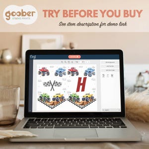 May include: A laptop screen displaying a digital design template for a birthday banner featuring a large red letter "H" and a checkered flag with monster trucks in blue, red, green, and yellow. The design is on a white background.