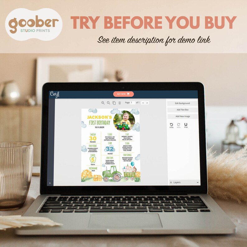 May include: A laptop screen displaying a digital design template for a first birthday party. The design features a tractor, a baby photo, and a list of milestones. The text "JACKSON'S FIRST BIRTHDAY" is at the top of the design. The text "TRY BEFORE YOU BUY" is displayed at the top of the laptop screen.