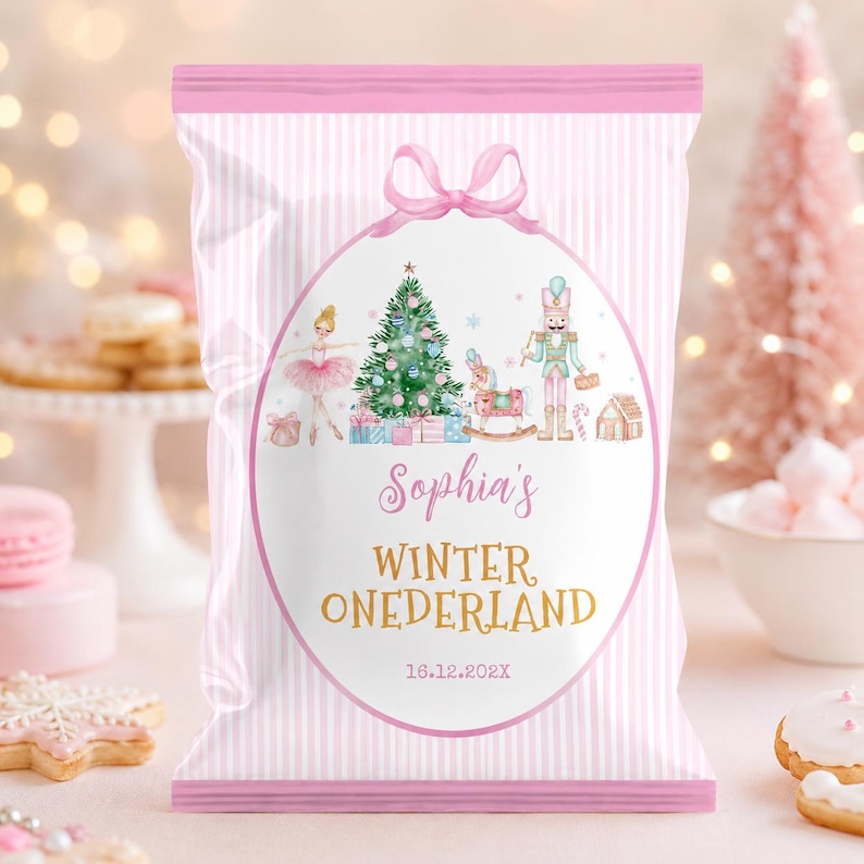 May include: A pink and white striped snack bag featuring a central oval graphic with a ballerina, a Christmas tree, a rocking horse, and a nutcracker. The text reads Sophia's WINTER ONEDERLAND and 16.12.202X, topped with a pink bow illustration.