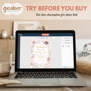 May include: A laptop displays a digital invitation design for "Amanda's Fairy First Birthday Party." The design features floral and fairy illustrations with the text "Try Before You Buy" and "See item description for demo link."