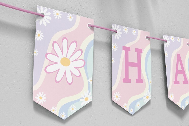 May include: A decorative banner featuring rectangular pennants strung on a pink cord. Each pennant displays a pastel wavy background with white daisy flowers and yellow centers. One pennant shows a large daisy, while others display the letters H and A.
