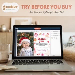 May include: A laptop screen displaying a customizable digital thank you card template with a photo of a smiling baby in a Santa hat, surrounded by Christmas-themed graphics including a gingerbread man, ornaments, and the text Thank you.