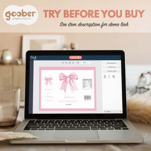 May include: A laptop screen displaying a digital design template for a first birthday party favor. The design features a pink watercolor bow, the text 'Juliana's FIRST BIRTHDAY', a nutrition facts label, a barcode, and 'Thank you for celebrating with me!'