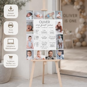 May include: A vertical milestone poster titled Oliver My First Year, featuring multiple photographs of a baby, birth details, and developmental milestones including 27 inches, 28 pounds, and 5 teeth, displayed on a light wooden easel stand.
