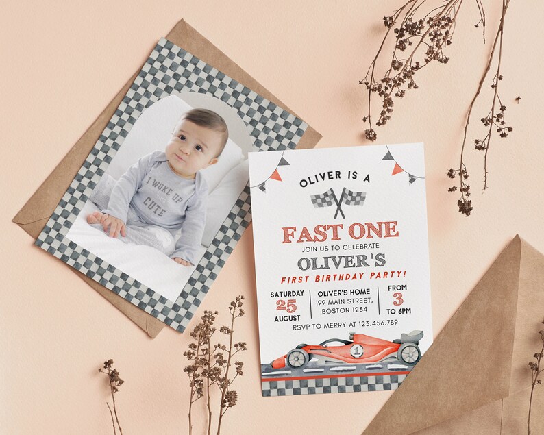 May include: A baby's first birthday party invitation with a race car theme. The invitation features a photo of the baby, a race car illustration, and the text "Oliver is a Fast One". The invitation is on a white background with red and gray accents.