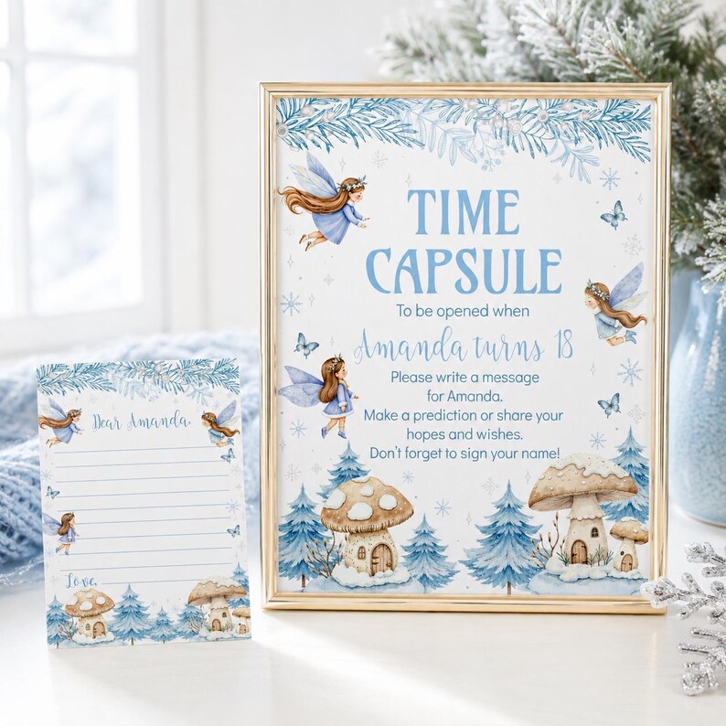 May include: A gold-framed sign and a matching card featuring blue fairy illustrations, mushrooms, and pine trees. The sign reads: TIME CAPSULE To be opened when Amanda turns 18. Please write a message for Amanda. Make a prediction or share your hopes and wishes. Don't forget to sign your name!