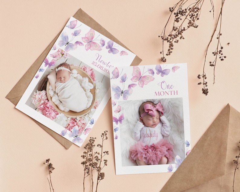 May include: Two baby milestone cards with watercolor butterfly designs. The first card says "Newborn 25.08.202" and features a photo of a baby sleeping in a basket. The second card says "One Month" and features a photo of a baby wearing a pink tutu and a headband.