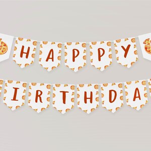 May include: A white banner with red letters spelling "Happy Birthday" and a pizza slice pattern. The banner is strung with white string.