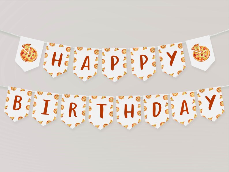 May include: A white banner with red letters spelling "Happy Birthday" and a pizza slice pattern. The banner is strung with white string.