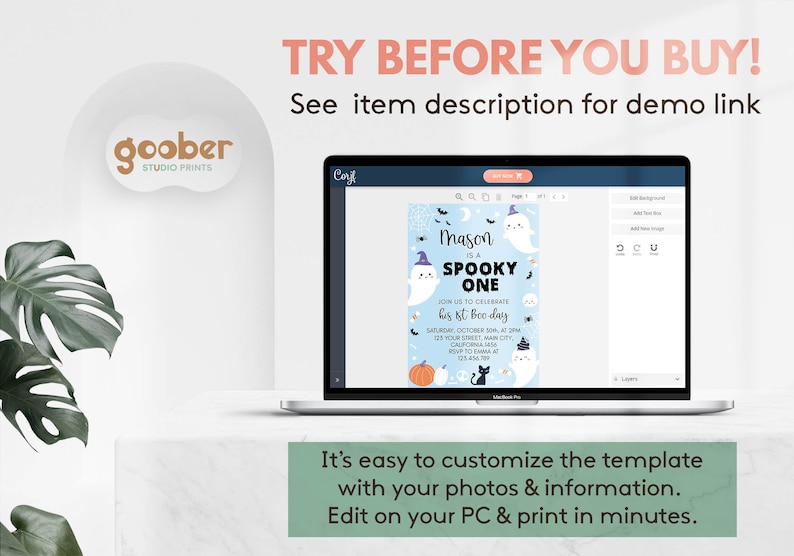 May include: A laptop screen displaying a light blue digital invitation template with Halloween graphics including ghosts, pumpkins, and a black cat. The text reads Mason is a SPOOKY ONE, join us to celebrate his 1st boo-day, and event details.