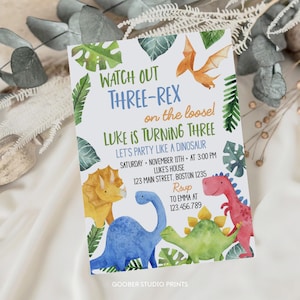 May include: A birthday party invitation with a dinosaur theme. The invitation features colorful watercolor illustrations of dinosaurs and tropical leaves. Text includes "Watch Out Three-Rex", "Luke is Turning Three", and party details.