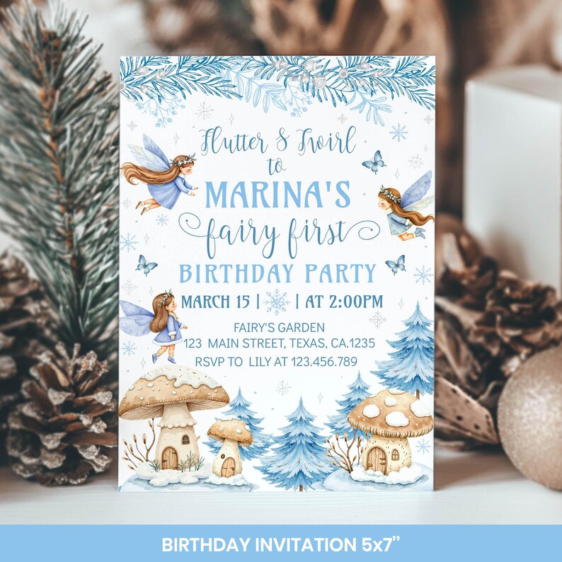 May include: A rectangular birthday invitation card featuring blue winter-themed illustrations of fairies, snow-dusted mushrooms, and pine trees. The text reads: Flutter & Twirl to MARINA'S fairy first BIRTHDAY PARTY MARCH 15 | AT 2:00PM FAIRY'S GARDEN 123 MAIN STREET, TEXAS, CA.1235 RSVP TO LILY AT 123.456.789. BIRTHDAY INVITATION 5x7.