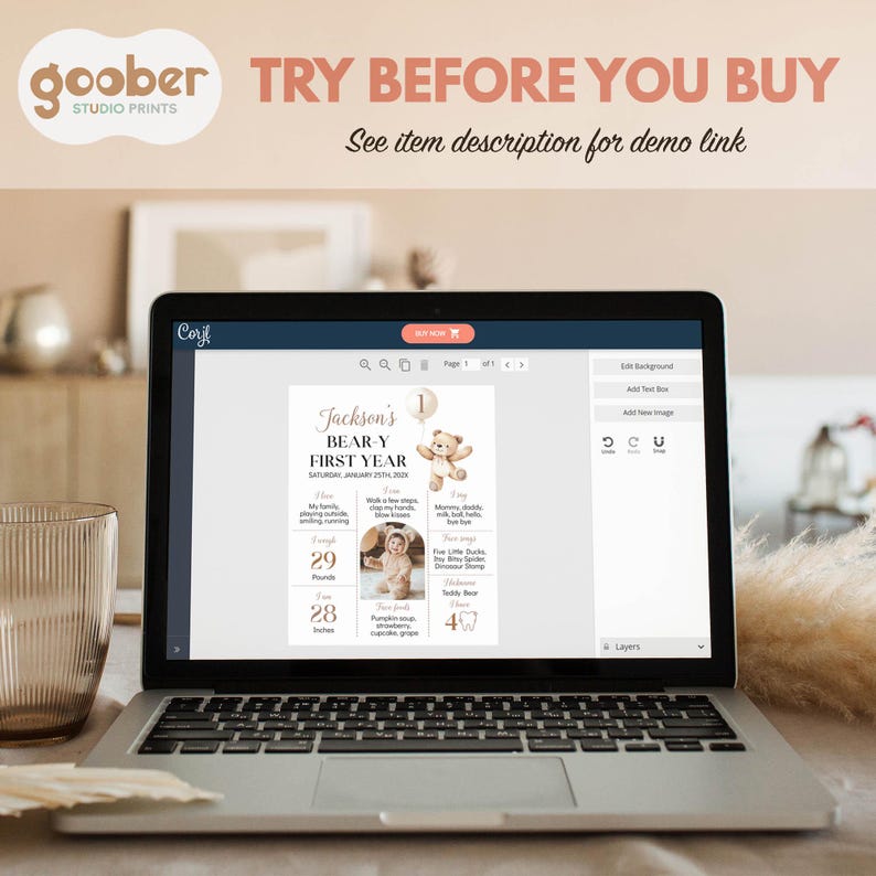 May include: A laptop screen displaying a digital design template for a first birthday party. The template features a bear theme with a photo of a baby and a list of milestones. The text on the screen reads "Jackson's Bear-Y First Year".