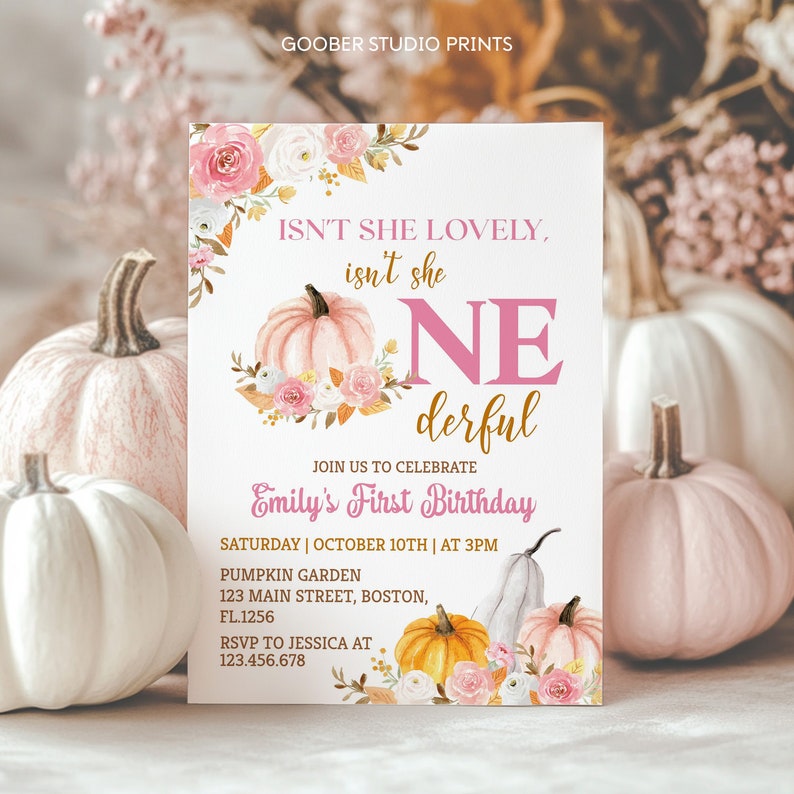 May include: A rectangular birthday invitation card featuring pink and white floral accents, a watercolor pumpkin, and the text: ISN'T SHE LOVELY, isn't she ONEderful, JOIN US TO CELEBRATE Emily's First Birthday, SATURDAY | OCTOBER 10TH | AT 3PM, PUMPKIN GARDEN, 123 MAIN STREET, BOSTON, FL.1256, RSVP TO JESSICA AT 123.456.678.