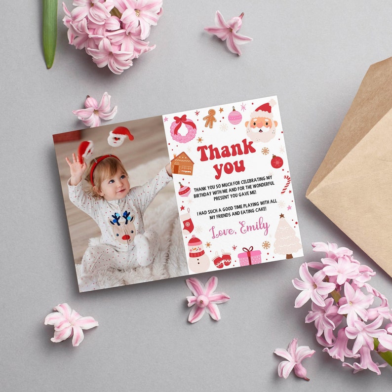 May include: A rectangular thank you card featuring a photograph of a toddler in a reindeer onesie on the left and Christmas-themed illustrations on the right. The text reads: Thank you, thank you so much for celebrating my birthday with me and for the wonderful present you gave me! I had such a good time playing with all my friends and eating cake! Love, Emily.