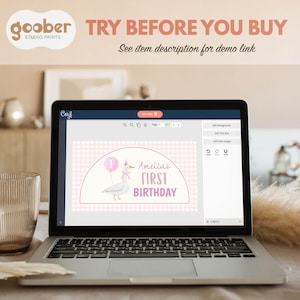 May include: A laptop screen displaying a digital design template for a first birthday party. The design features a white goose wearing a pink party hat and a pink balloon with the number one, alongside the text Amelia's FIRST BIRTHDAY.