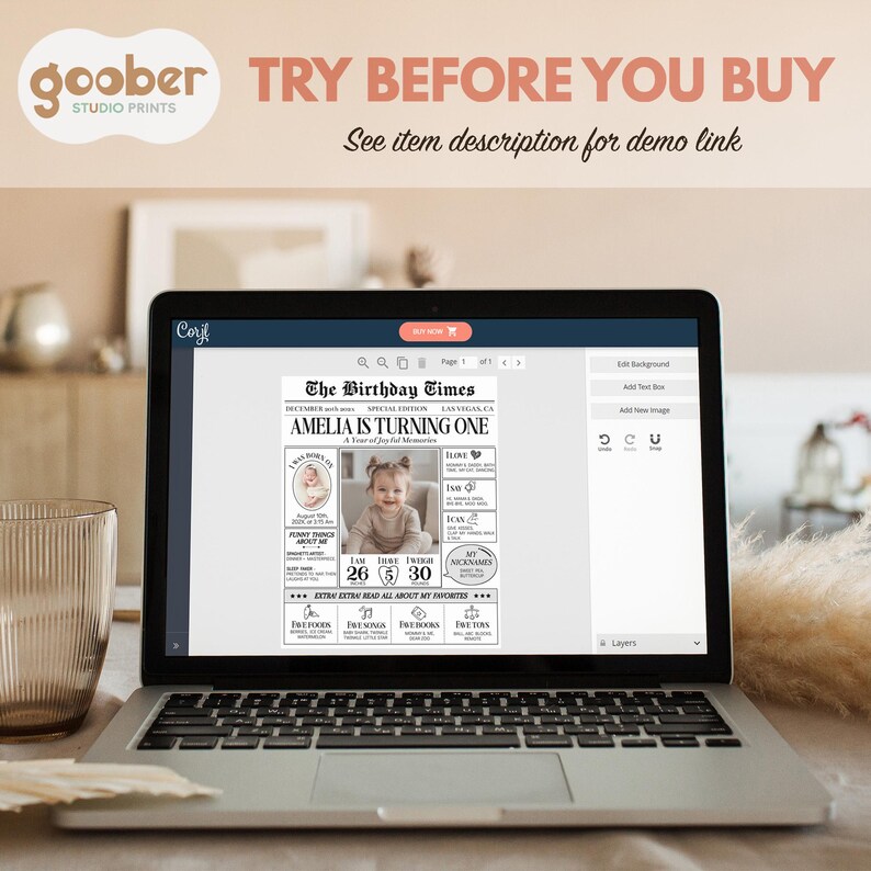 May include: A laptop screen displaying a digital template for a first birthday newspaper titled The Birthday Times. The design features a photo of a child, text sections for birth details, favourites, and milestones, all set within a web-based editor.