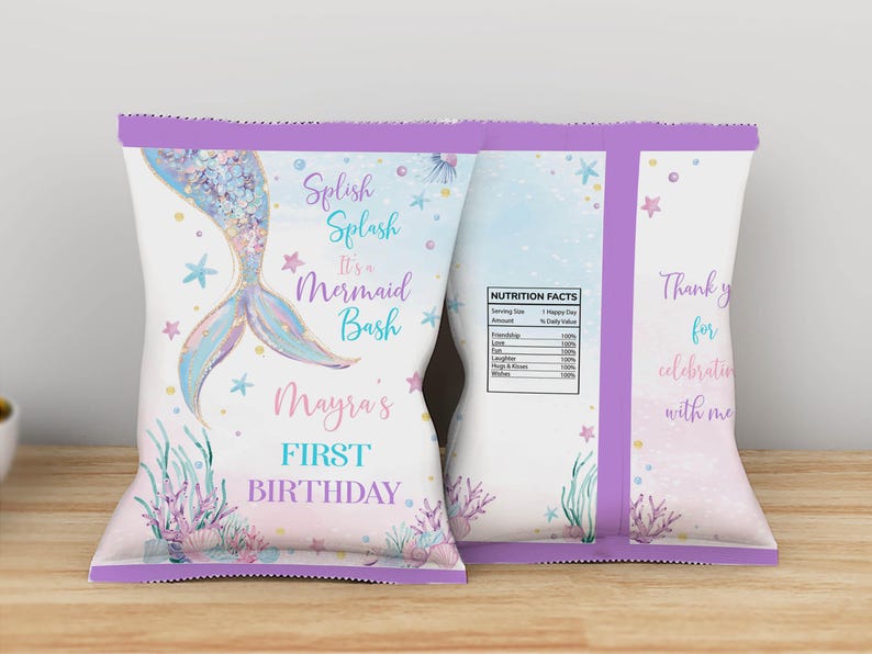 May include: Two custom chip bags featuring a mermaid tail illustration, pastel watercolor accents, and sea-themed graphics. Text includes Splish Splash It's a Mermaid Bash, Mayra's FIRST BIRTHDAY, and a nutrition facts label listing friendship and love.