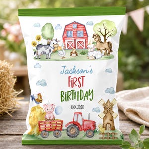 May include: A white snack bag with green top and bottom borders featuring watercolor farm illustrations including a red barn, a cow, a horse, a pig, a tractor, and a windmill. The text reads Jackson's FIRST BIRTHDAY 10.01.202X.