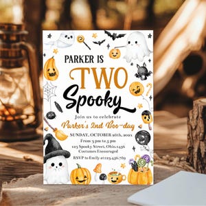 以下が含まれることがあります： ハロウィーンをテーマにした長方形の招待状。Parker is Two Spooky, Join us to celebrate Parker's 2nd Boo-day, Sunday, October 28th, 202x, from 3 pm to 5 pm, 123 Spooky Street, Ohio.1456, Costumes Encouraged, RSVP to Emily at 123.456.789. というテキストが記載されています。