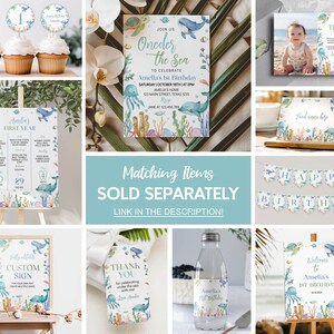 Puede incluir: Un conjunto de decoraciones de fiesta imprimibles para un primer cumplea&ntilde;os con un tema de bajo el mar. Las decoraciones incluyen un cartel de bienvenida, un cartel personalizado, un cartel del primer a&ntilde;o, un cartel de agradecimiento, una pancarta, adornos para cupcakes y una etiqueta para botella de agua. Las decoraciones presentan una ilustraci&oacute;n de acuarela de una ballena, una medusa, un caballito de mar y coral.