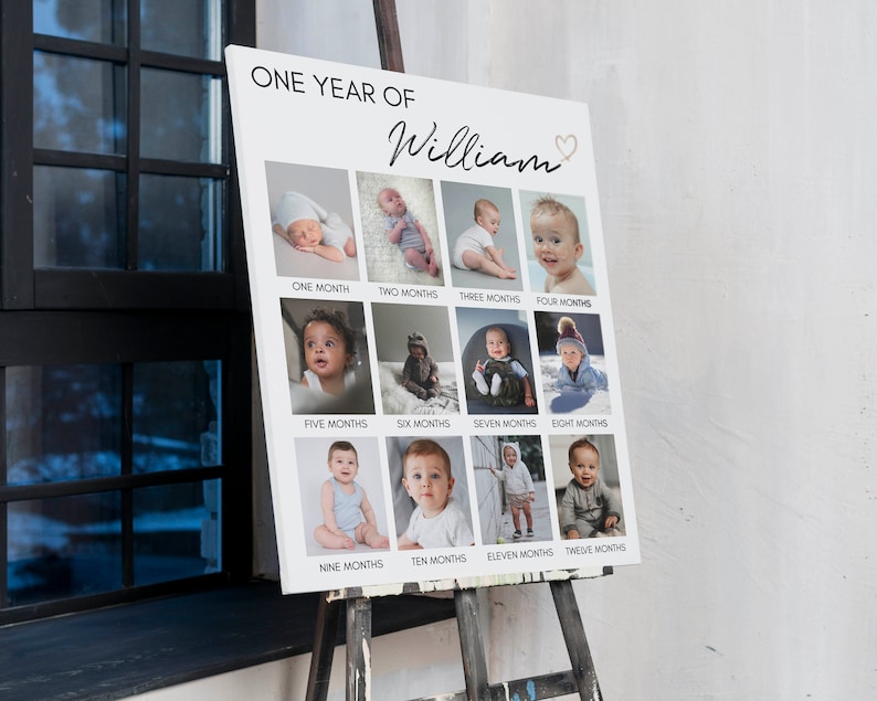May include: A white rectangular photo collage board titled ONE YEAR OF William with a heart icon. It features twelve individual square photographs of a baby arranged in three rows, each labelled with the corresponding age from one to twelve months.