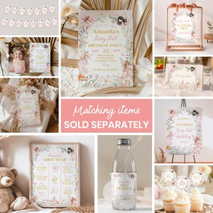 May include: A set of printable party decorations for a first birthday party with a fairy theme. The decorations include a banner, invitation, cupcake toppers, a welcome sign, a water bottle label, and a sign for a first year milestone chart. The decorations feature a pink and gold color scheme with floral and fairy illustrations.