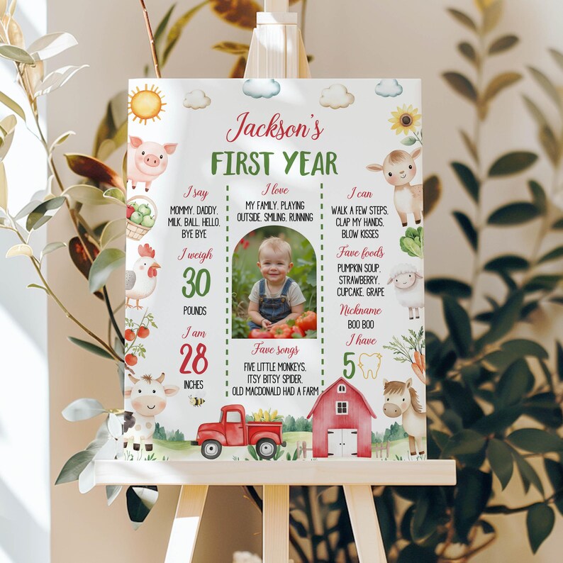 K&ouml;nnte beinhalten: Ein farbenfrohes Poster f&uuml;r den ersten Geburtstag mit einem Bauernhof-Thema. Das Poster zeigt ein Foto eines kleinen Jungen sowie Details zu seinem ersten Lebensjahr, darunter sein Gewicht, seine Gr&ouml;&szlig;e, seine Lieblingsessen und Lieder. Das Poster ist mit Bauernhoftieren, einem roten Lastwagen und einem Bauernhof dekoriert.