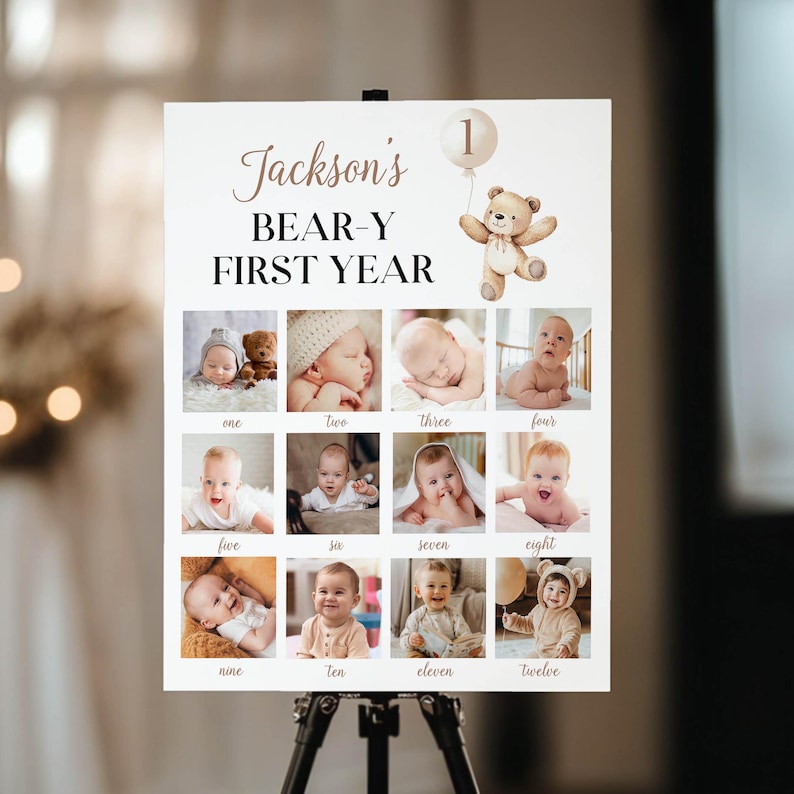 May include: A white poster with the text "Jackson's BEAR-Y FIRST YEAR" and a teddy bear holding a balloon. The poster has 12 photo squares with pictures of a baby boy at different ages.