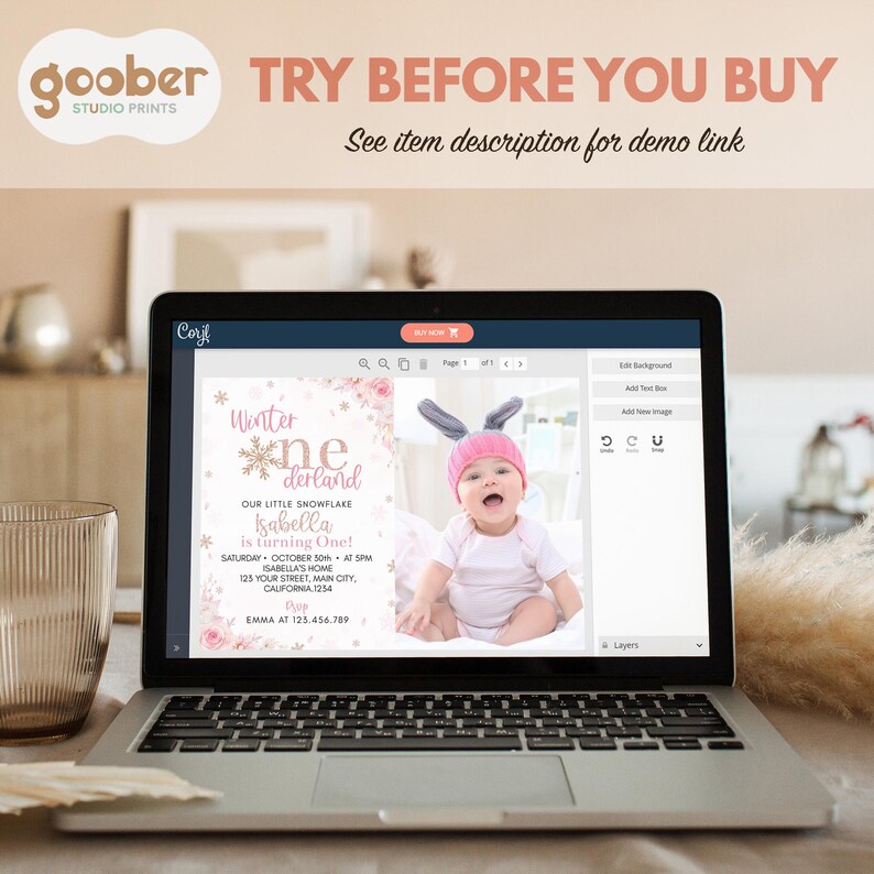 May include: A laptop screen displaying a customizable digital invitation template for a first birthday party. The design features pink floral accents, snowflake graphics, and text reading Winter Wonderland, Our Little Snowflake, Isabella is turning One.