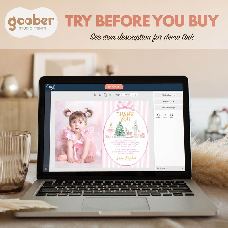 May include: A laptop screen displaying a digital design interface for a thank you card. The card features a photo of a baby in a pink dress next to a graphic of a Christmas tree, a nutcracker, and the text Thank You, Love, Sophie.